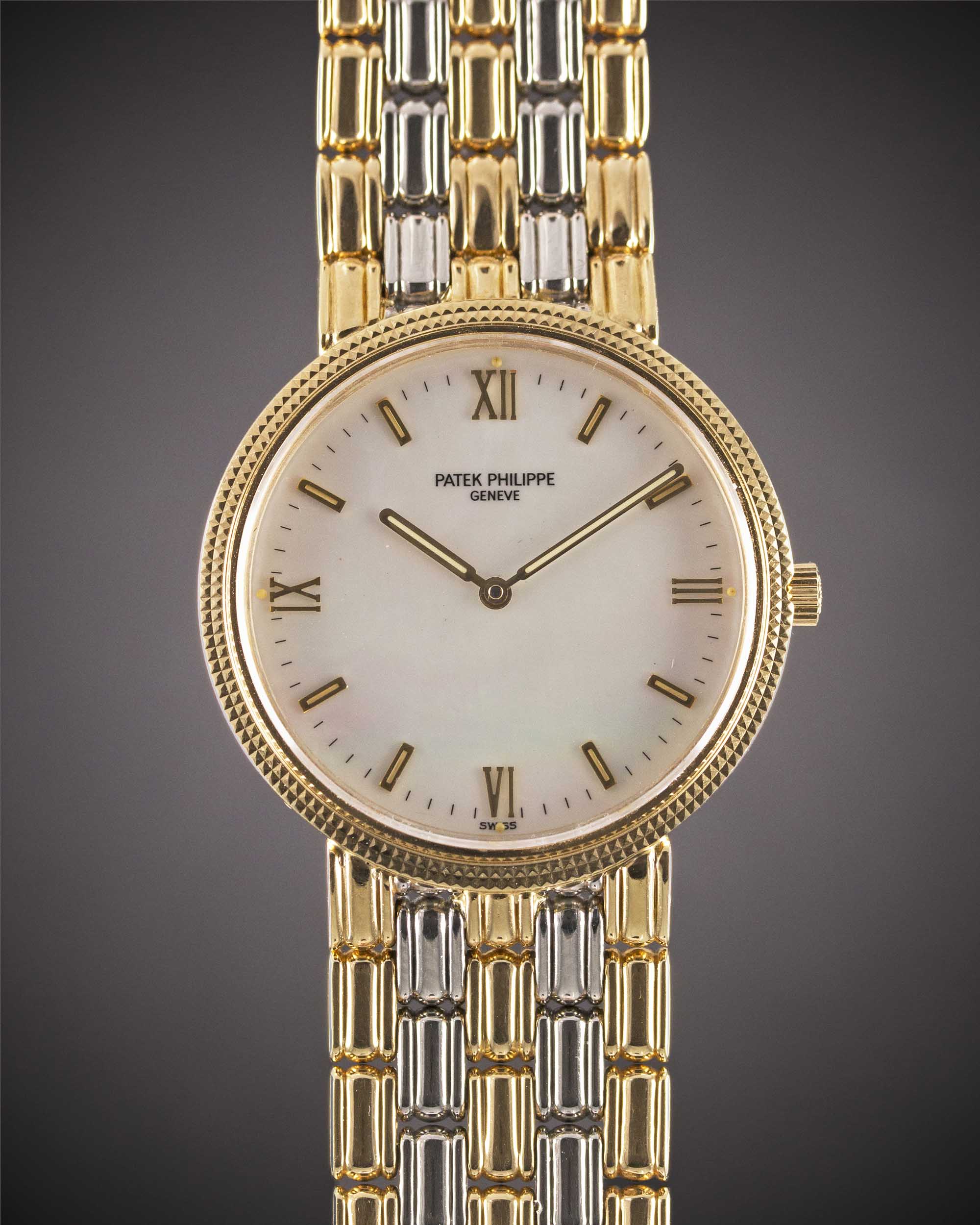 A GENTLEMAN'S SIZE 18K SOLID YELLOW & WHITE GOLD PATEK PHILIPPE CALATRAVA BRACELET WATCH CIRCA