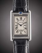 A GENTLEMAN'S STAINLESS STEEL CARTIER TANK BASCULANTE 