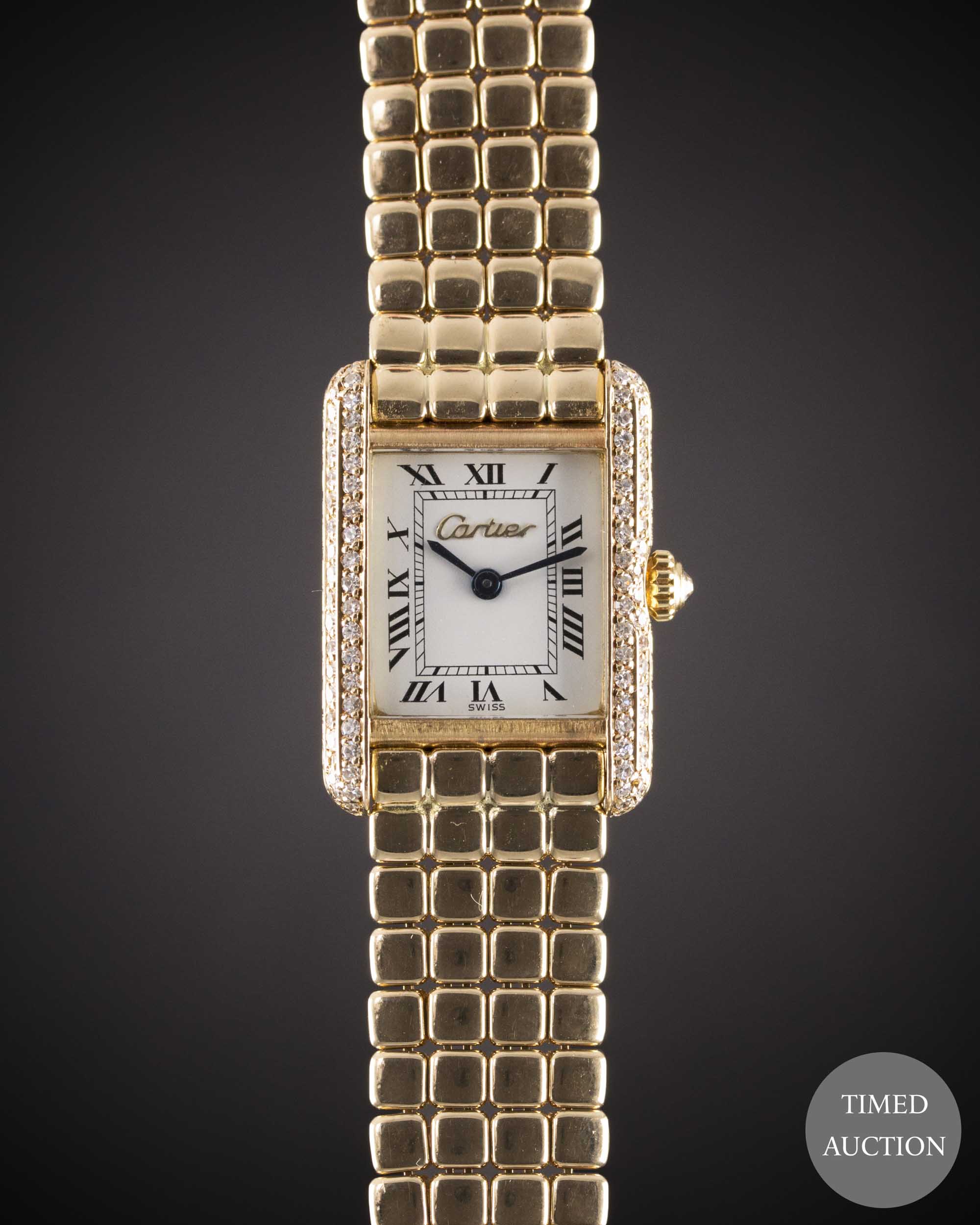 A LADIES 18K SOLID GOLD CARTIER TANK BRACELET WATCH CIRCA 1990s Movement: Quartz, signed Cartier.