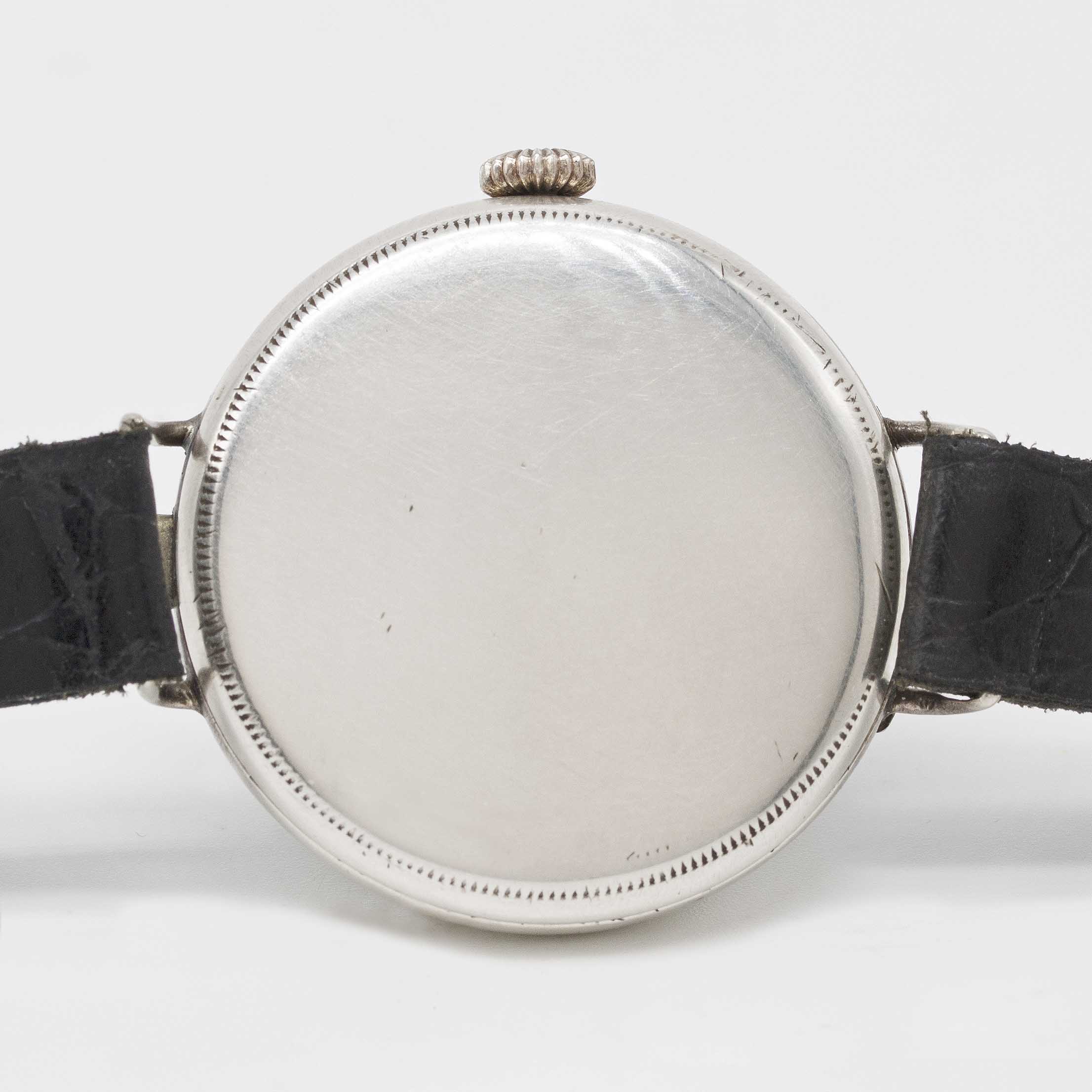 A GENTLEMAN'S SOLID SILVER ROLEX HALF HUNTER OFFICERS WRIST WATCH CIRCA 1920, WITH ENAMEL DIAL - Image 6 of 7