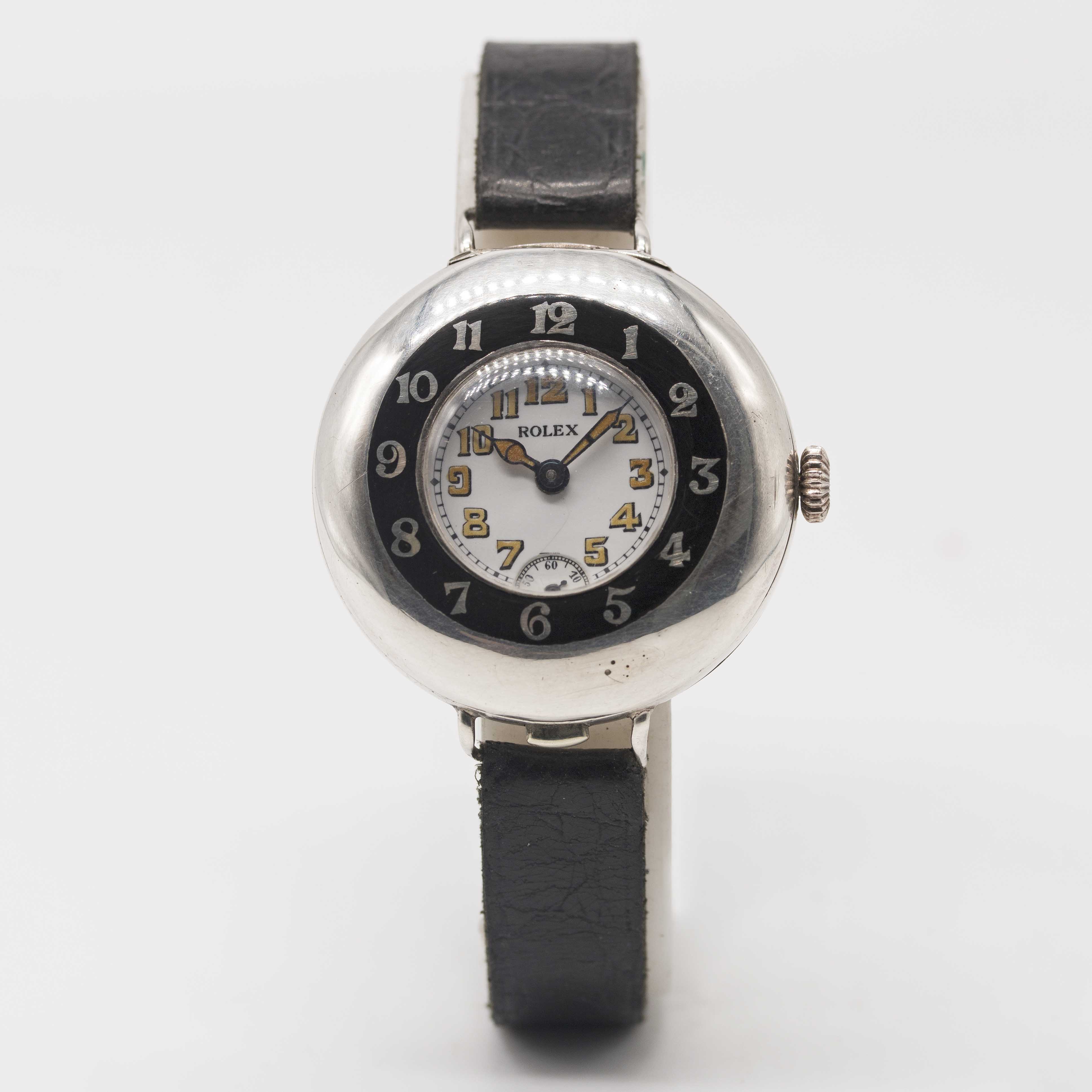 A GENTLEMAN'S SOLID SILVER ROLEX HALF HUNTER OFFICERS WRIST WATCH CIRCA 1920, WITH ENAMEL DIAL - Image 2 of 7