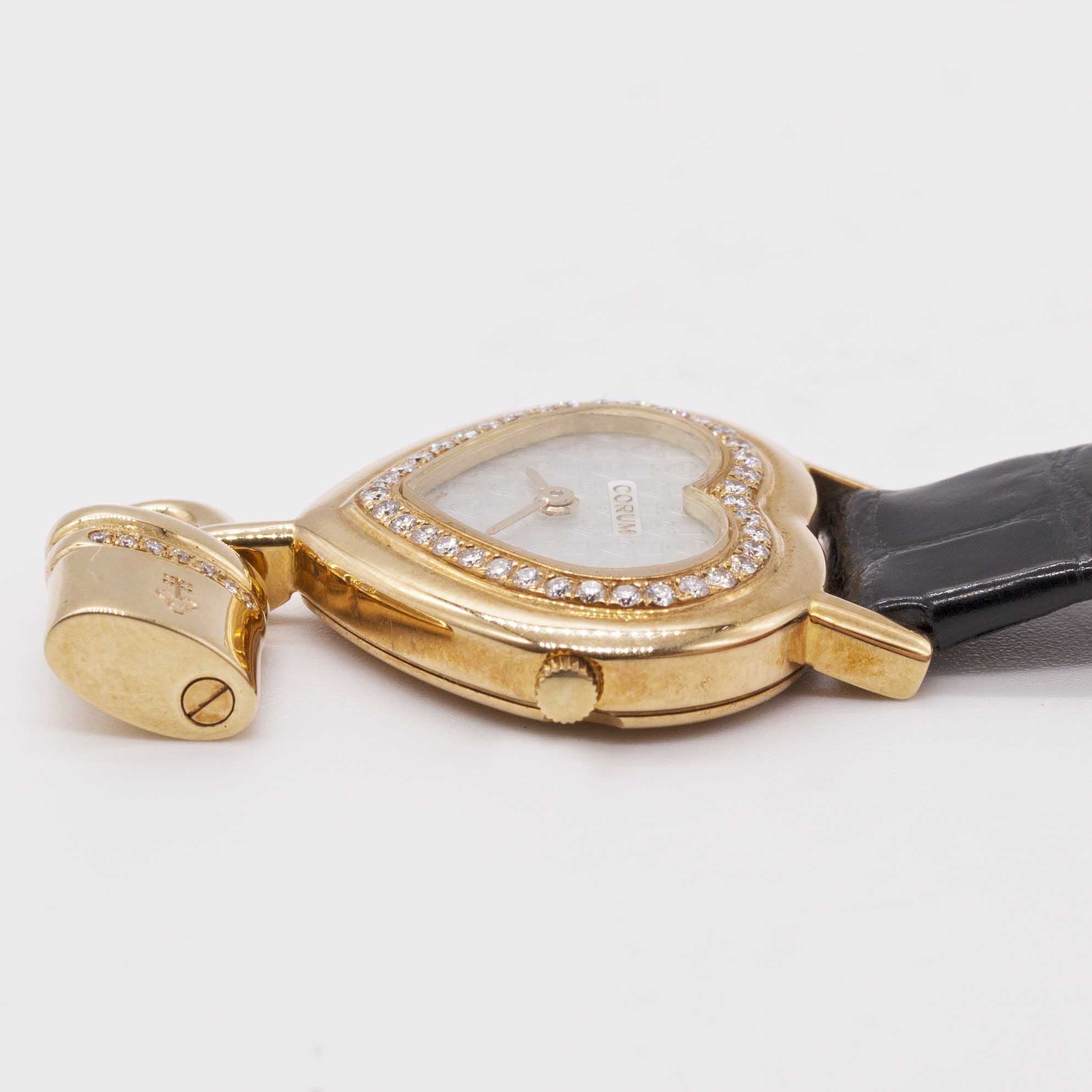A LADIES 18K SOLID GOLD & DIAMOND CORUM HEART LOCKET WRIST WATCH CIRCA 1990s, REF. 24.181.65 WITH - Image 7 of 8