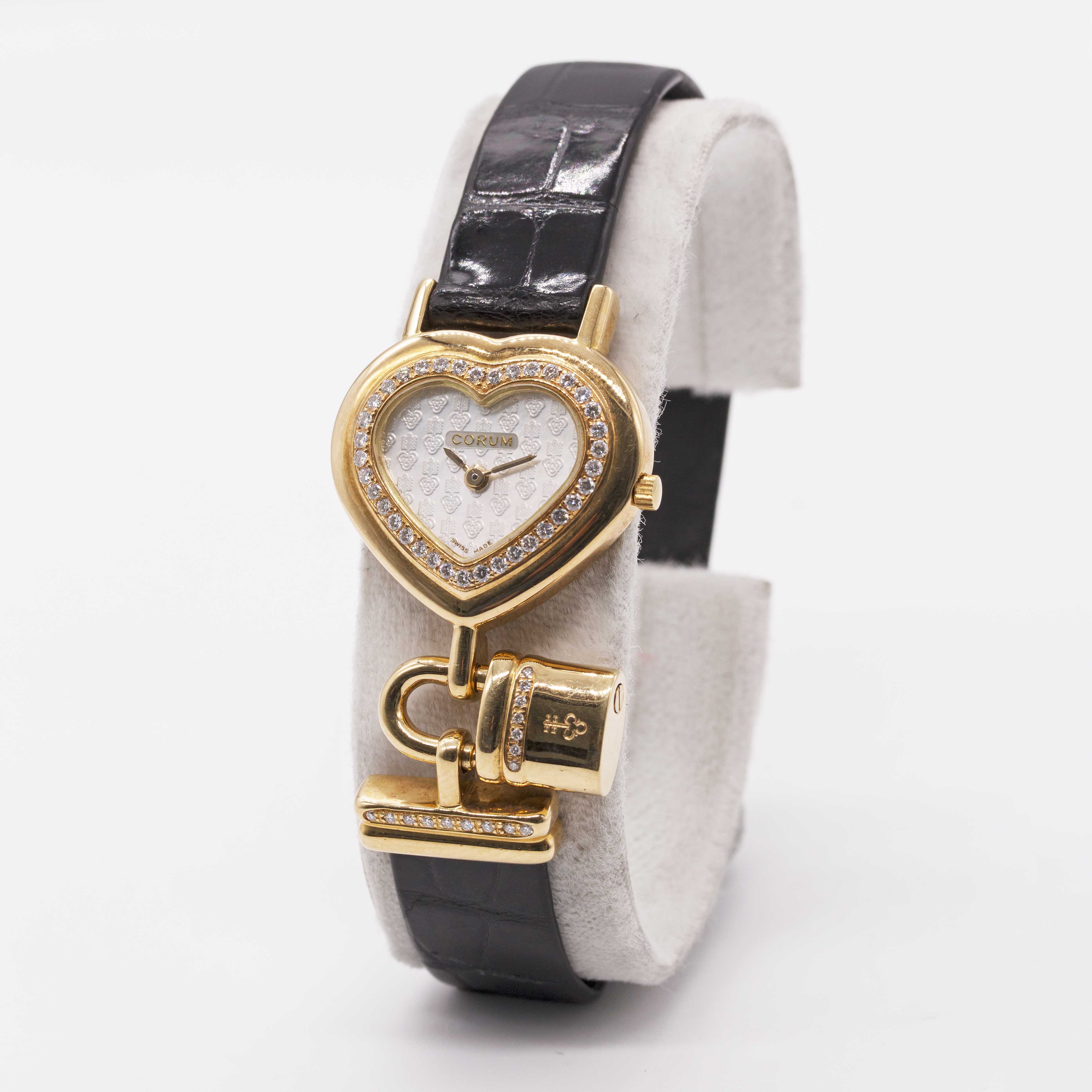 A LADIES 18K SOLID GOLD & DIAMOND CORUM HEART LOCKET WRIST WATCH CIRCA 1990s, REF. 24.181.65 WITH - Image 3 of 8