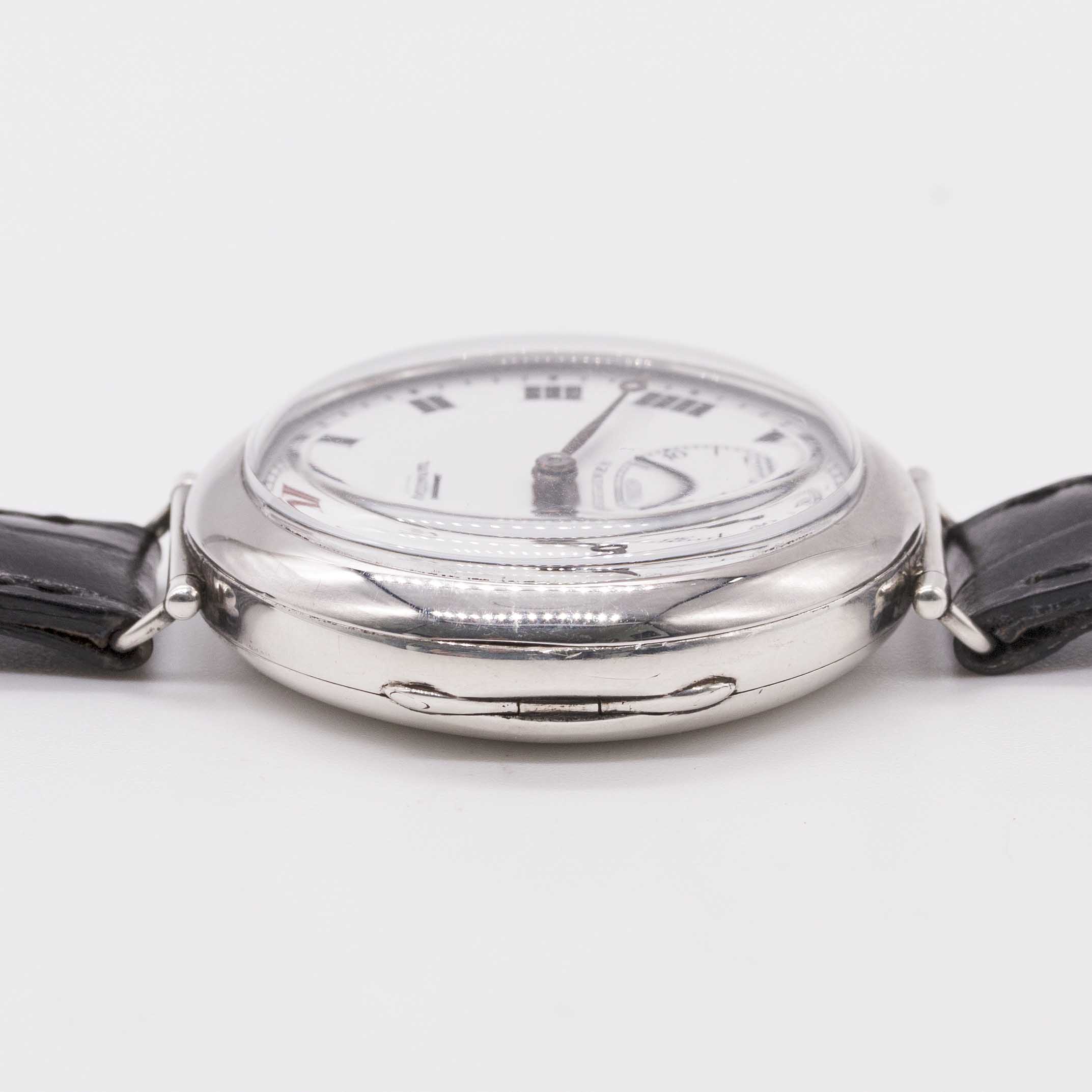 A GENTLEMAN'S SOLID SILVER LONGINES MAPPIN OFFICERS WRIST WATCH CIRCA 1918, ENAMEL DIAL WITH ROMAN - Image 10 of 10