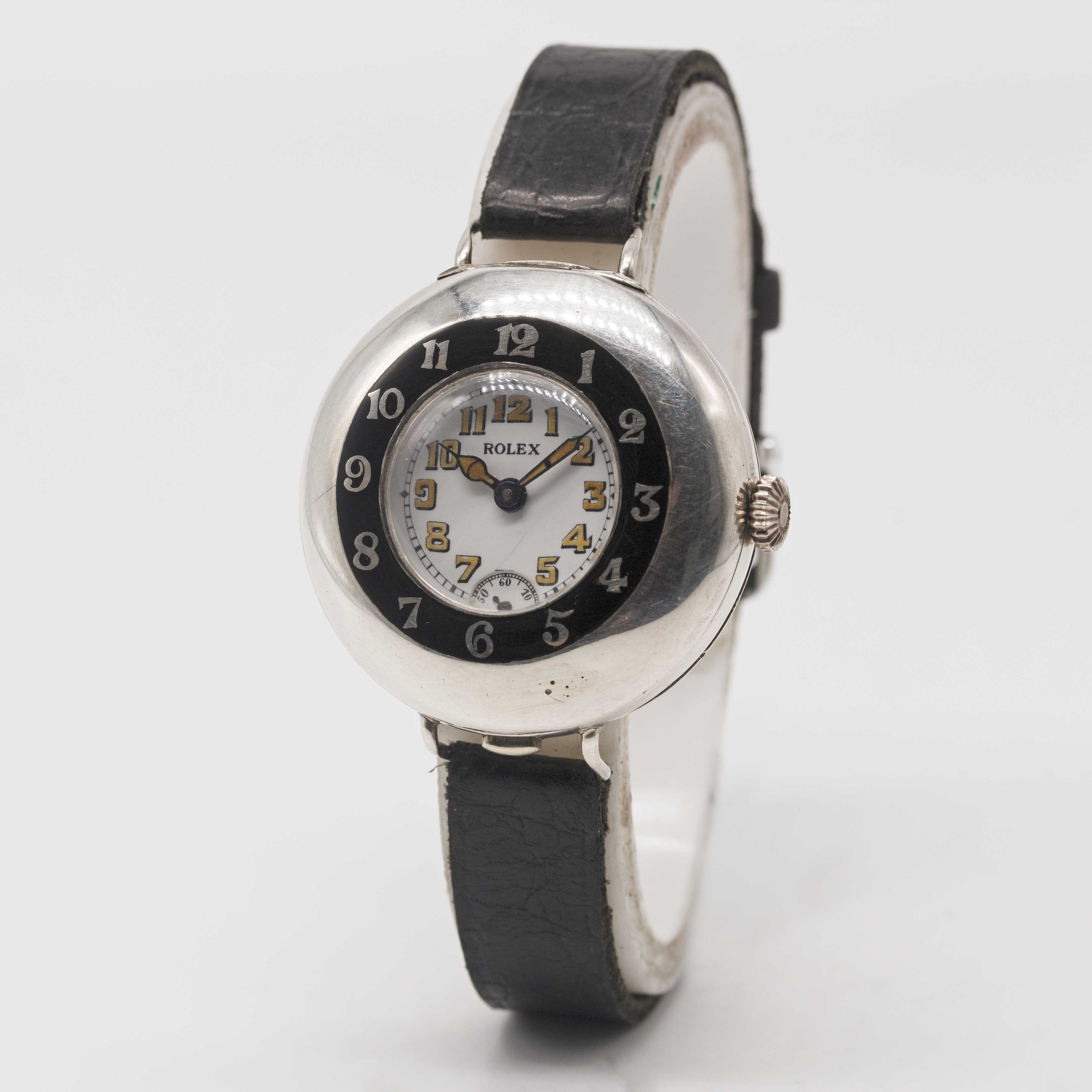 A GENTLEMAN'S SOLID SILVER ROLEX HALF HUNTER OFFICERS WRIST WATCH CIRCA 1920, WITH ENAMEL DIAL - Image 3 of 7