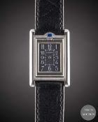 A LADIES STAINLESS STEEL CARTIER TANK BASCULANTE WRIST WATCH CIRCA 2000, REF. 2386 WITH SPECIAL