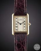 A GENTLEMAN'S SIZE SOLID SILVER GILT MUST DE CARTIER TANK VERMEIL WRIST WATCH CIRCA 1990s, REF. 1615