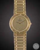 AN 18K SOLID YELLOW GOLD CORUM ROMVLVS BRACELET WATCH CIRCA 1990s, RETAILED BY CHAUMET Movement: