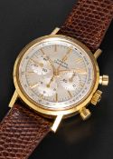A FINE GENTLEMAN'S 18K SOLID YELLOW GOLD OMEGA SEAMASTER CHRONOGRAPH WRIST WATCH CIRCA 1965, REF.