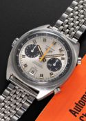 A GENTLEMAN'S STAINLESS STEEL HEUER CARRERA AUTOMATIC CHRONOGRAPH BRACELET WATCH DATED 1971, REF.