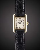 A RARE LADIES 18K SOLID GOLD CARTIER LONDON TANK 