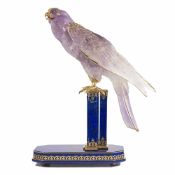 A RARE GOLD & DIAMOND SET OBJET D'ART MODEL OF A FALCON PERCHED ON A GOLD & LAPIS LAZULI BASE