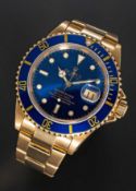 A RARE GENTLEMAN'S 18K SOLID YELLOW GOLD ROLEX OYSTER PERPETUAL DATE SUBMARINER BRACELET WATCH CIRCA