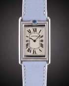 A GENTLEMAN'S STAINLESS STEEL CARTIER TANK BASCULANTE 