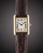 A LADIES 18K SOLID GOLD CARTIER PARIS TANK MECANIQUE WRIST WATCH CIRCA 1980s Movement: 17J, manual