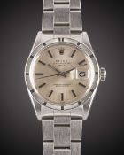 A GENTLEMAN'S STAINLESS STEEL ROLEX OYSTER PERPETUAL DATE BRACELET WATCH CIRCA 1974, REF. 1501