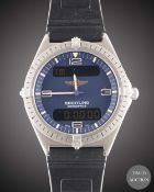 A GENTLEMAN'S TITANIUM BREITLING AEROSPACE MULTIFUNCTION WRIST WATCH CIRCA 1990s, REF. E56060