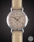 A GENTLEMAN'S LARGE SIZE STAINLESS STEEL JAEGER LECOULTRE TRIPLE CALENDAR WRIST WATCH CIRCA 1940s,