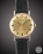 A GENTLEMAN'S 9CT SOLID GOLD ROLEX TUDOR SHOCK RESISTING WRIST WATCH CIRCA 1969, WITH CHAMPAGNE