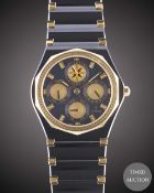 A GENTLEMAN'S BLACK TUNGSTEN & GOLD CORUM ADMIRAL 