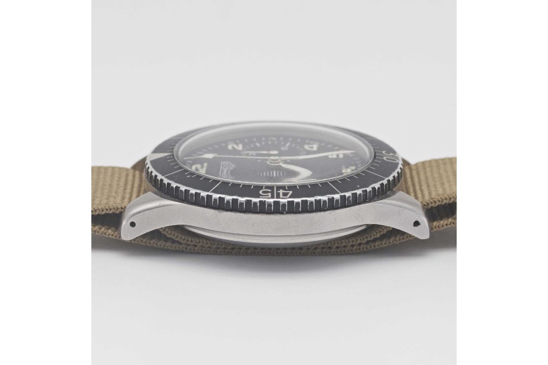 A GENTLEMAN'S STAINLESS STEEL GERMAN MILITARY HEUER BUND FLYBACK CHRONOGRAPH WRIST WATCH CIRCA 1970, - Image 8 of 8
