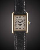 A GENTLEMAN'S SIZE 18K SOLID GOLD CARTIER TANK CALENDAR MOONPHASE WRIST WATCH CIRCA 1990s