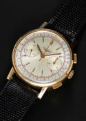 A GENTLEMAN'S 18K SOLID ROSE GOLD LONGINES FLYBACK CHRONOGRAPH WRIST WATCH CIRCA 1960s, REF. 7414
