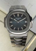 A GENTLEMAN'S STAINLESS STEEL PATEK PHILIPPE NAUTILUS BRACELET WATCH DATED 2009, REF. 5711/1 WITH