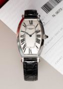 A FINE GENTLEMAN'S PLATINUM TONNEAU CINTREE MECANIQUE WRIST WATCH DATED 2000, REF. 2664 WITH CARTIER