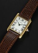 A RARE GENTLEMAN'S SIZE 18K SOLID GOLD CARTIER LONDON TANK 