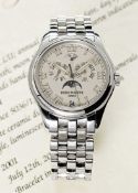 A FINE GENTLEMAN'S 18K SOLID WHITE GOLD PATEK PHILIPPE ANNUAL CALENDAR MOONPHASE BRACELET WATCH