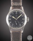A GENTLEMAN'S STAINLESS STEEL BRITISH MILITARY OMEGA W.W.W. WRIST WATCH CIRCA 1945, PART OF THE 