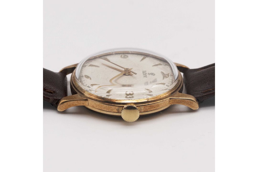 A GENTLEMAN'S 9CT SOLID GOLD ROLEX TUDOR WRIST WATCH CIRCA 1950s, REF. 12856 WITH SILVER "HONEYCOMB" - Image 9 of 10