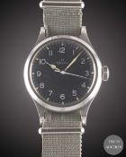 A GENTLEMAN'S STAINLESS STEEL BRITISH MILITARY OMEGA RAF PILOTS WRIST WATCH DATED 1956, WITH GLOSS