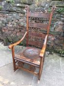 C19th arts and craft armchair rocker