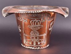 A large copper ice bucket