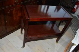 VINTAGE TABLE TWO TIER METAMORPHIC TEA TROLLEY TEA TABLE WITH REVOLVING MECHANISM.