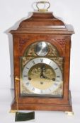 Burr Walnut 8 day Comitti Break Arch Triple Chime Clock