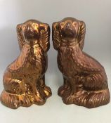 Two mismatched Antique Wally Fireside Dogs Copper Lustre Spaniels 20cm Tall