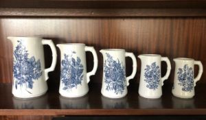 An Antique Art Nouveau Set of 5 Blue & White Jugs by Royal Worcester