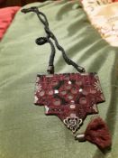 Necklace. Needle work of persian carpet motifs. Red
