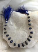 Sapphire Blue drops 4/3 6/10 mm 50 cts on a strand drilled top