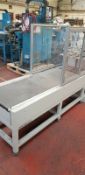 Tecnau Stacker Deliver with stacker and drop delivery conveyor