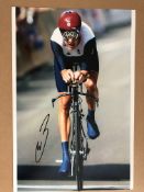 4 sporting photos signed, genuine signature.