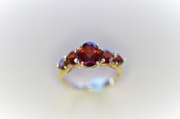 Gold 5 Stone Garnet Ring