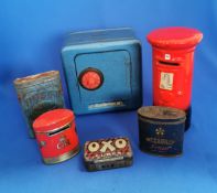 Group of collectable tins and money boxes in vintage condition