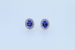 18 White Gold Tanzanite And Diamond Stud Earrings