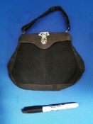 Vintage Evening Handbag with ornate clasp.