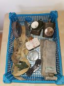 Group lot of various military items including machine gun parts tin.
