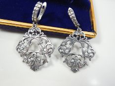 Silver rhomboid shaped earrings